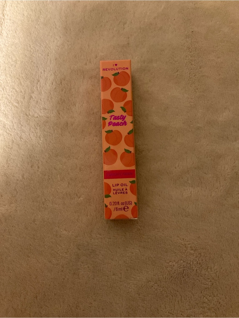 Revolution Tasty Peach Lip Oil - Peach Orange Packaging